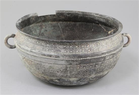 A Chinese archaic bronze flat-bottomed vessel, Eastern Zhou dynasty, 5th-4th century B.C., 31cm wide, losses